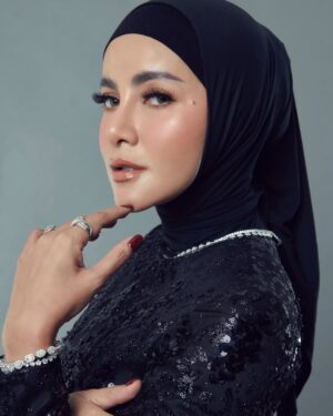 Olla Ramlan Instagram - Me for @allemanagement #allemanagement2025

Dress from @julianto.official

Jewelry from @clemenceellery

MUA by @arie_khayz @ariekhayzmakeup

Hijab by @ida_hijabstylish 

#olramstyle