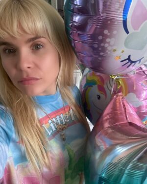 Paloma Faith Instagram - I threw my youngest a party at the weekend.

Joyous screams, jelly and ice cream, balloons popping, hysteria and loud music. And then they left, running off to their father’s house because it was “his night.” The house once bursting with energy, now sat still.. Carefree mess, deflated balloons, smeared chocolate on pink velvet chairs.

I sat and stared at the wall, full of sugar, wondering if I was fat and ugly now or just tired and old, after being kept awake by excited children the night before. This was a tragedy one cannot explain. The sound, the frenetic energy completely stopped. The promise of other kids screaming outside, hoping it was my own, saying they couldn’t bear to leave and wanted to come back. But it wouldn’t be. It shouldn’t be. They need both parents.

So they hugged me on their way out, smiling, saying, “Thank you, Mama, for the best party ever.”

And then I was there, worn out, glazed, wondering if I should spend the rest of my free time tidying their mess or go and drink three margaritas and smoke roll-ups…

This was lonely.