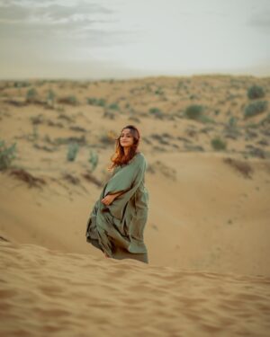 Poojitha Instagram - “Sunlight on my face, smile on my heart” ❤️

Thank you @razee_rasheed @seven_days_media for choosing this atmosphere and thank you @_kirankm_ for these captures 🩷🩷

#dubai #desert #nature #love #actress #poojithamenon