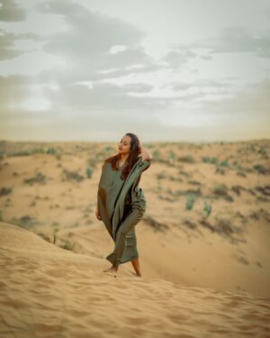 Poojitha Instagram - “Sunlight on my face, smile on my heart” ❤️

Thank you @razee_rasheed @seven_days_media for choosing this atmosphere and thank you @_kirankm_ for these captures 🩷🩷

#dubai #desert #nature #love #actress #poojithamenon