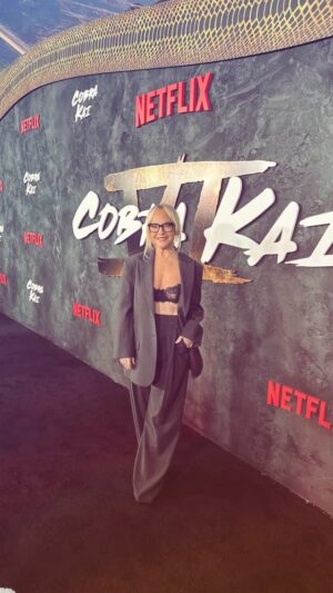 Rachael Harris Instagram - Cobra Kai Premiere 2/12/2025 🐍🥋💥
Had the best time at the @cobrakaiseries  premiere!  Got to see my old friend and @lucifernetflix writer of 6 seasons @chrisrafferty who wrote the beautiful, funny & emotional first of two episodes shown! 
Congrats to all involved in the making♥️

Makeup: @tracewatkins
Hair: @kaileystylezz
Fit: @anandarose
Heels: @Schutzofficial
Suit: @Acler
Ring: @UNOde50
Ring: @sifsjakobsjewellery
Earrings: @shopmiraco
Glasses: @warbyparker
Glow: @holytans 
Nails: @santamonicanail 

@michelemariepr
@infinitycre8ive
@tfg.pr