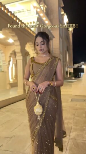 Ravina tekwani Instagram - Sorry  ek correction hai, I MADE the most Gorgeous Saree 🫶🏻 
.
.
Not just designed but literally made it with my own hands! Every single embellishment is done by me! 
And trust me it looks 10X better in person 🖤
.
.
.
.
#saree #cocktaildress #cocktailsaree #weddingdress #westernsaree #indiansaree #indianfashion 
Saree, cocktail saree, indian fashion, wedding fashion,
