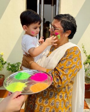 Ridhima Ghosh Instagram - This Dol Purnima, we are celebrating with bright hues, happy hearts, and the warmth of family. Dheer is discovering the joy of Holi with Ma joining in the fun, and every splash of colour is a new memory in the making!

Wishing you all a Holi as vibrant and joyful as today! 💛💙❤️💚 

#DolPurnima #HoliHai