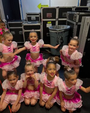 Sabrina Bryan Instagram - Little Miss Monroe and her girls are ready for COMP! Our first @ocpaaofficial Preview Show was one for the books! Watching her shine on stage was beyond emotional and OMG these costumes are a dream come true for this mama bear! 

Huge thank you to @candice_mihm and @rachelfazendin for working with our girls and creating the perfect routines for their girls first season! They have come SO FAR since auditions, you guys are truly the best! Can’t wait to see them at their first competition! #ocpaa #dancemoms #dancecoachbecomesdancemom #godhelpme #herewego #bestcostumesever