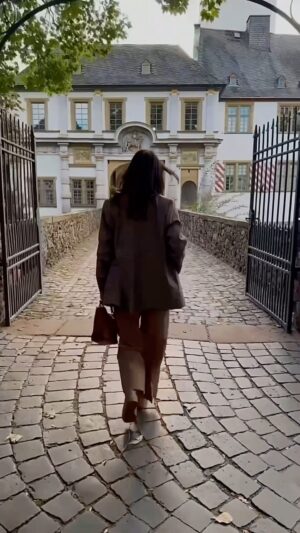 Shazia Naz Instagram - From soaking up the sunny vibes to feeling the evening chill Höchst wore two personalities in a day! 🇩🇪 

Walking through its medieval laneways, the famed half timbered architecture and Hoechst’s endless historical buildings it transforms like a movie scene bustling cafes turning into cozy corners, streets bustling with life turning into quiet alleys lit with warm glows. This town sure knows how to rock the ‘day to night’ transition! 🌞🌜 

📍 Hochster Schloplatz 
📍 Schloss Cafe Höchst 
📍 Hochster Schloss 
📍 Bolongaropalast 

🤎 in Love with the shades of brown in everything.

Check brown blazer & trouser @mango 

#shazianazkhan #frankfurthöchst #travelstyle #germanytravel #deutchland #daytonight #chicstyle #blazerstyle #fitcheck