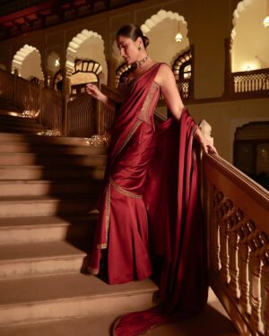 Shereen Sikka Instagram - Not for one second do I take for granted being able to work and create with legends like @taruntahiliani and @kareenakapoorkhan to make magic. I love you both! 
With the best teams ever for @iifa 
@kareenakapoorkhan in @taruntahiliani couture and @birdhichand and @amrapalijewels 
styled with @shereenlovebug 

‘A sublime interplay of deep wine and antique gold, this ensemble is a modern revival of our archival 2008 piece—reimagined for today while retaining its timeless essence. The Bidri-inspired embroidery, enriched with exquisite dabka and nakshi detailing, pays homage to heritage craftsmanship. The ensemble takes the classic sculpted saree corset and amalgamates it with the drape of a fluid textile cape, striking a balance between structure and softness. A true expression of India Modern—where the past is not just remembered but brought to life with contemporary relevance.’ - Tarun Tahiliani 
A Big Thank you to Tarun’s amazing team! 

Photography- @thirddimension
Choker and earrings- @birdhichand
Cuff and ring- @amrapalijewels
Bag- @motifsbysurabhididwania 
My team @stylebyvanshika @niyatiij 
My management @alisha5dave 
beauty @savleenmanchanda @bbhiral