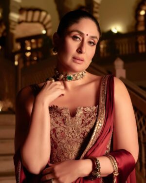 Shereen Sikka Instagram - Not for one second do I take for granted being able to work and create with legends like @taruntahiliani and @kareenakapoorkhan to make magic. I love you both! 
With the best teams ever for @iifa 
@kareenakapoorkhan in @taruntahiliani couture and @birdhichand and @amrapalijewels 
styled with @shereenlovebug 

‘A sublime interplay of deep wine and antique gold, this ensemble is a modern revival of our archival 2008 piece—reimagined for today while retaining its timeless essence. The Bidri-inspired embroidery, enriched with exquisite dabka and nakshi detailing, pays homage to heritage craftsmanship. The ensemble takes the classic sculpted saree corset and amalgamates it with the drape of a fluid textile cape, striking a balance between structure and softness. A true expression of India Modern—where the past is not just remembered but brought to life with contemporary relevance.’ - Tarun Tahiliani 
A Big Thank you to Tarun’s amazing team! 

Photography- @thirddimension
Choker and earrings- @birdhichand
Cuff and ring- @amrapalijewels
Bag- @motifsbysurabhididwania 
My team @stylebyvanshika @niyatiij 
My management @alisha5dave 
beauty @savleenmanchanda @bbhiral