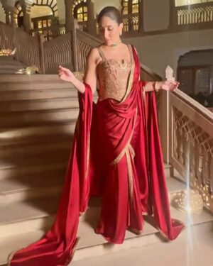 Shereen Sikka Instagram - Not for one second do I take for granted being able to work and create with legends like @taruntahiliani and @kareenakapoorkhan to make magic. I love you both! 
With the best teams ever for @iifa 
@kareenakapoorkhan in @taruntahiliani couture and @birdhichand and @amrapalijewels 
styled with @shereenlovebug 

‘A sublime interplay of deep wine and antique gold, this ensemble is a modern revival of our archival 2008 piece—reimagined for today while retaining its timeless essence. The Bidri-inspired embroidery, enriched with exquisite dabka and nakshi detailing, pays homage to heritage craftsmanship. The ensemble takes the classic sculpted saree corset and amalgamates it with the drape of a fluid textile cape, striking a balance between structure and softness. A true expression of India Modern—where the past is not just remembered but brought to life with contemporary relevance.’ - Tarun Tahiliani 
A Big Thank you to Tarun’s amazing team! 

Photography- @thirddimension
Choker and earrings- @birdhichand
Cuff and ring- @amrapalijewels
Bag- @motifsbysurabhididwania 
My team @stylebyvanshika @niyatiij 
My management @alisha5dave 
beauty @savleenmanchanda @bbhiral
