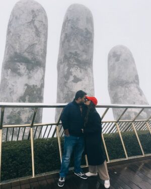 Shubhi Garg Agarwal Instagram - // The mighty Golden Hands Bridge 🌟🌁

The entire Bana Hills were covered in fog and we were freezing!!!! 🥶 As we walked on the bridge, we realised the authorities have removed the glass ramp and have replaced it with wooden flooring for the tourists to walk comfortably.
But I was so excited to see the glass ramp. Bummer! 😔

Nevertheless, we enjoyed our experience as we lived the magical moments at this iconic site. 🤩 
PS : The best time to visit Bana Hills is during the sumner if you want to see the greenery around and the bridge clearly.

There’s so much more at Bana Hills to explore. Taking you through the trip in my next posts. Stay tuned.
.
.
.
.
.
.
.
.
#pickeratpace #indianblogger #indiantravelblogger #vietnam #vietnamtravel #vietnamtrip #banahills #banahillsvietnam #goldenhandsbridge [vietnam bana hills, bana hills vietnam, golden hands bridge vietnam, indian travel influencer, danang vietnam]