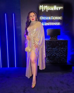 Stephanie Timmins Instagram - Scintillating evenings draped in liquid gold ✨️✨️ dressed in @houseoffett for the French luxury fragrance launch #DÉSIRTOXICLINTENSE @parfumsmicallef @parcosbeauty @baccarosebeauty 💙

( Gold Drape Gown, Gold Gown, Red Carpet Dress)
#golddress #drapegown #goldgown #redcarpetdress #feistyfoxdiaries #fashioninfluencer #glamlook #redlips #ootd #lookoftheday #luxuryinfluencer ##luxurylifestyle