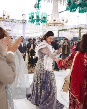 Zara Noor Abbas Instagram - Ufhhh This day was more than just a wedding - it was a celebration of love, family, and resilience. Despite the rain’s best efforts to dampen our spirits, we persevered and made this day unforgettable. 
Somethings I’ll never forget - running in and out of halls in the coldest day of Lahore, having rain washing away the decor and food stalls - watching my little brother become a husband and making sure his lady love was okay. The rain may have tried to ruin our perfect plans, but it only made this day more memorable. I’m so so grateful for the love and support of our family and friends who made this day so special. It would have been NOTHING without you all. My Event managers @zawaajevents and my @the_videographers Were the stars of the show. How they managed to capture everything and my Event person who made sure everything looked stunning even after the chaos. THANK YOU SO MUCH. Also a huge shout out to @ayesha.shoaib.malik for making my beautiful dress and giving me the perfect fit for my brothers walima. 

Apki shaaadi hogayeeee Amuuuu bhai, and Congratulations -  @ahmadabbasgill on finding your soulmate and @ssameen._ Welcome to the Family 🎉🥲 🫂🥲🧿🤍🪄