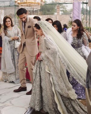 Zara Noor Abbas Instagram - Ufhhh This day was more than just a wedding - it was a celebration of love, family, and resilience. Despite the rain’s best efforts to dampen our spirits, we persevered and made this day unforgettable. 
Somethings I’ll never forget - running in and out of halls in the coldest day of Lahore, having rain washing away the decor and food stalls - watching my little brother become a husband and making sure his lady love was okay. The rain may have tried to ruin our perfect plans, but it only made this day more memorable. I’m so so grateful for the love and support of our family and friends who made this day so special. It would have been NOTHING without you all. My Event managers @zawaajevents and my @the_videographers Were the stars of the show. How they managed to capture everything and my Event person who made sure everything looked stunning even after the chaos. THANK YOU SO MUCH. Also a huge shout out to @ayesha.shoaib.malik for making my beautiful dress and giving me the perfect fit for my brothers walima. 

Apki shaaadi hogayeeee Amuuuu bhai, and Congratulations -  @ahmadabbasgill on finding your soulmate and @ssameen._ Welcome to the Family 🎉🥲 🫂🥲🧿🤍🪄