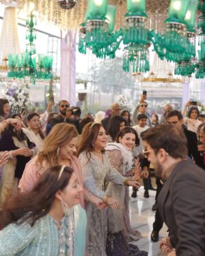 Zara Noor Abbas Instagram - Ufhhh This day was more than just a wedding - it was a celebration of love, family, and resilience. Despite the rain’s best efforts to dampen our spirits, we persevered and made this day unforgettable. 
Somethings I’ll never forget - running in and out of halls in the coldest day of Lahore, having rain washing away the decor and food stalls - watching my little brother become a husband and making sure his lady love was okay. The rain may have tried to ruin our perfect plans, but it only made this day more memorable. I’m so so grateful for the love and support of our family and friends who made this day so special. It would have been NOTHING without you all. My Event managers @zawaajevents and my @the_videographers Were the stars of the show. How they managed to capture everything and my Event person who made sure everything looked stunning even after the chaos. THANK YOU SO MUCH. Also a huge shout out to @ayesha.shoaib.malik for making my beautiful dress and giving me the perfect fit for my brothers walima. 

Apki shaaadi hogayeeee Amuuuu bhai, and Congratulations -  @ahmadabbasgill on finding your soulmate and @ssameen._ Welcome to the Family 🎉🥲 🫂🥲🧿🤍🪄