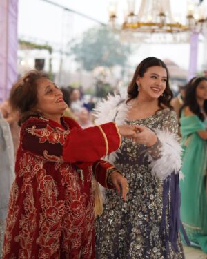 Zara Noor Abbas Instagram - Ufhhh This day was more than just a wedding - it was a celebration of love, family, and resilience. Despite the rain’s best efforts to dampen our spirits, we persevered and made this day unforgettable. 
Somethings I’ll never forget - running in and out of halls in the coldest day of Lahore, having rain washing away the decor and food stalls - watching my little brother become a husband and making sure his lady love was okay. The rain may have tried to ruin our perfect plans, but it only made this day more memorable. I’m so so grateful for the love and support of our family and friends who made this day so special. It would have been NOTHING without you all. My Event managers @zawaajevents and my @the_videographers Were the stars of the show. How they managed to capture everything and my Event person who made sure everything looked stunning even after the chaos. THANK YOU SO MUCH. Also a huge shout out to @ayesha.shoaib.malik for making my beautiful dress and giving me the perfect fit for my brothers walima. 

Apki shaaadi hogayeeee Amuuuu bhai, and Congratulations -  @ahmadabbasgill on finding your soulmate and @ssameen._ Welcome to the Family 🎉🥲 🫂🥲🧿🤍🪄