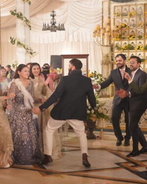 Zara Noor Abbas Instagram - Ufhhh This day was more than just a wedding - it was a celebration of love, family, and resilience. Despite the rain’s best efforts to dampen our spirits, we persevered and made this day unforgettable. 
Somethings I’ll never forget - running in and out of halls in the coldest day of Lahore, having rain washing away the decor and food stalls - watching my little brother become a husband and making sure his lady love was okay. The rain may have tried to ruin our perfect plans, but it only made this day more memorable. I’m so so grateful for the love and support of our family and friends who made this day so special. It would have been NOTHING without you all. My Event managers @zawaajevents and my @the_videographers Were the stars of the show. How they managed to capture everything and my Event person who made sure everything looked stunning even after the chaos. THANK YOU SO MUCH. Also a huge shout out to @ayesha.shoaib.malik for making my beautiful dress and giving me the perfect fit for my brothers walima. 

Apki shaaadi hogayeeee Amuuuu bhai, and Congratulations -  @ahmadabbasgill on finding your soulmate and @ssameen._ Welcome to the Family 🎉🥲 🫂🥲🧿🤍🪄