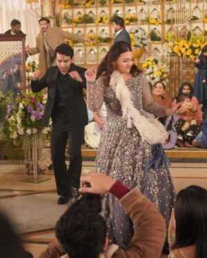 Zara Noor Abbas Instagram - Ufhhh This day was more than just a wedding - it was a celebration of love, family, and resilience. Despite the rain’s best efforts to dampen our spirits, we persevered and made this day unforgettable. 
Somethings I’ll never forget - running in and out of halls in the coldest day of Lahore, having rain washing away the decor and food stalls - watching my little brother become a husband and making sure his lady love was okay. The rain may have tried to ruin our perfect plans, but it only made this day more memorable. I’m so so grateful for the love and support of our family and friends who made this day so special. It would have been NOTHING without you all. My Event managers @zawaajevents and my @the_videographers Were the stars of the show. How they managed to capture everything and my Event person who made sure everything looked stunning even after the chaos. THANK YOU SO MUCH. Also a huge shout out to @ayesha.shoaib.malik for making my beautiful dress and giving me the perfect fit for my brothers walima. 

Apki shaaadi hogayeeee Amuuuu bhai, and Congratulations -  @ahmadabbasgill on finding your soulmate and @ssameen._ Welcome to the Family 🎉🥲 🫂🥲🧿🤍🪄