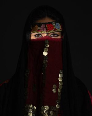 Zhalay Sarhadi Instagram - Palestinian Thobe 🍉

Amani Geha wears a 65-year-old traditional widow’s thobe from Beersheba, passed down through generations as a family heirloom. Rich in history, this handmade garment reflects the Bedouin style of the region, showcasing vibrant motifs and intricate embroidery that are more than just beautiful—they are storytellers. Each stitch carries deep meaning, with symbols like the geometric designs signifying fertility.

Palestinian thobes have long marked social status and identity. Each region has its own unique patterns. These garments, carefully crafted by hand over months, were made for life’s major events—weddings, mourning, and daily wear.

Today, the thobe is a symbol of cultural resistance and pride, worn at protests and global events to assert Palestinian identity. This photograph celebrates that resilience and the vital role of preserving these timeless traditions for future generations.

تَرتدي أماني جحا ثوبًا فلسطينياً تقليديًا من مدينة بئر السبع عمره فوق ال 65 عامًا، وقد تم توريثه عبر الأجيال كإرث عائلي. هذا الثوب اليدوي غني بالتاريخ ويعكس أسلوب البدو في المنطقة، حيث تظهر الزخارف النابضة بالحياة والتطريز الدقيق الذي ليس فقط جميلاً، بل يروي قصصًا. كل غرزة تحمل معنى عميقًا، فمثلاً ترمز التصاميم الهندسية الخصوبة. لطالما كان الثوب الفلسطيني علامة على المكانة الاجتماعية والهوية. ولكل منطقة في فلسطين أنماطها الفريدة. هذه الأثواب، التي يتم صنعها بعناية يدويًا على مدار شهور، صُنعت لتناسب المناسبات المهمة في الحياة، مثل حفلات الزفاف، والحداد، واللباس اليومي.

اليوم، يمثل الثوب رمزًا للمقاومة الثقافية والفخر، حيث يُرتدى في المظاهرات والمناسبات العالمية للتأكيد على الهوية الفلسطينية. تحتفي هذه الصورة بتلك القوة والصمود، والدور الهام في الحفاظ على هذه التقاليد الخالدة للأجيال القادمة.

Project credit:
Lead cast: @amaniegeha 
Director, Writer, Producer, DOP, Gaffer, Editor, Sound, Colorist: @moamenghanim 
Thoub generously provided by @feda_allouh 
Stylist: @ayatallax 
Makeup artist: @makeupbymaab 
Production assistant, BTS videographer: @janaislam___ 
1st AD, BTS videographer: @murielletannous 
Special thanks for @tasweer.qa @dohafirestation @almayassabnthamad @qatar_museums for facilitating the filming location
Source: @aljazeera