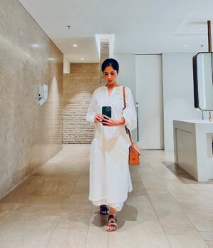 aiana jain Instagram - You can tell 2 things about me from this picture !!
One is that I go to @jioworlddrive a lot (mostly for work ) and second that I wear a lot of white clothes (IFYYK)
 I am in my perimenopause and hot flashes are a thing for me starting 10 days ago and I have been living in my mulmuls these days considering I behave like someone whose thermostat is totally off ( that’s how senior articulates my situation right now ) , I love my loose cotton clothes especially the ones I design for my self because it’s always made to be worn for comfort !!!! 
I wore this for an event at @clinique_in yesterday and everyone just loved it , made a woman in her perimenopause very happy !!! I have been told to start my label pronto … !!! And this time I am contemplating it with all the seriousness!!! Just got an earful from @aparrnawritesbeauty !!! That’s the news from yesterday and today !!! 
.
. Outfit : Designed by Yours Truly 
. Footwear : My favourite @charleskeithofficial 
. Bag : @marcjacobs 
.
.
.
.
.
.
.
.
.
.
.
. #aianajsays #aianajloves #aianajstyles #everydaystyle #aianaj #indianfashionblogger #love #find #count #divine #shebang