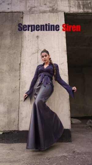 soundarya thakur Instagram - Serpentine Siren 🧜‍♀️🚨 .. Story of a graceful mermaid who turns into a commanding serpent. It’s a journey of shedding softness for strength, trading innocence for power, and embracing the duality of femininity.

This look embodies the duality of femininity—soft yet fierce, fluid yet commanding. 
These structured shoulders, flowing leather skirt, and gold-braided ponytail celebrate transformation, strength, and unapologetic evolution. It’s the beauty of becoming.

Wearing @qua.clothing 🖤

#highfashion #empoweringwomen #strongwomen #quaclothing #fashionblogger #moodoftheday #outfitinspiration #soundaryathakur #formocloset