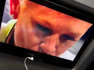 Anne Burrell Instagram - Ok… so this is a first… watching myself last night on #houseofknives while on a flight to Vegas!!! I was eating airplane snacks, knitting and watching like a crazy lady!! I think I look pretty good up there on the throne!!! Thank you to Nikol the lovely flight attendant who took the photo. 😊#ilovewhatido #luckygirl