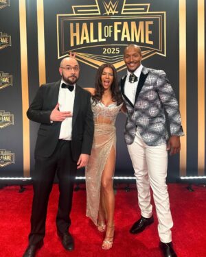 Jackie Redmond Instagram - She’s so lucky.✨ WWE Hall Of Fame, 2025. 📸

GLAM: @ianmaxion 
Tan: @minaluxurytan 
Hair ext: @bellamihair 
Dress: @mewmewsofficial 

#wwe #wwehof #wwehalloffame #wweraw