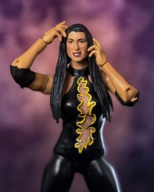 Lisa Marie Varon Instagram - Showcasing my first custom for Wrestlemania weekend 🕸️🖤💛

As you all may have seen on my stories, I have been putting in WORK for this upcoming weekend. Currently have 16 NEW customs made for wrestlers… Still needing to make 2 more before Thurs when I leave for Vegas 🤯

So excited to gift this custom to @reallisamarie during @officialwrestlecon!! My all-time favorite gear of hers! 

#wwevictoria #lisamarievaron #survivorseries #wrestlemania41 #wrestlecon #wrestlemaniaweekend #customactionfigures #actionﬁgurephotography #wwefanart #wweart #wrestlingfigurephotography #prowrestling