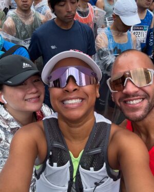 Phoebe Robinson Instagram - YES, BITCH! My third marathon in eleven months! YES, BITCH, my first time running one without an injury or an illness. YES, BITCH, I shaved SEVENTEEN MINUTES off my best marathon time, which was last year’s Boston Marathon! Whoo! A PR (personal record) for PR (that’s me, Phoebe Robinson, lol). But NO BITCH, I didn’t have a “Lost in Translation” meet cute/whirlwind soulmance aka soul romance w/an old ass piece of gabagool around Tokyo. #WomenCantHaveItAll 

For real tho, running the @tokyomarathonfoundation was a dream that started a year ago when @mrshanlui & I texted each other to say we should go for it and try and get into the marathon. Somehow we both did (me as a charity runner & her via the lottery). And then we were like HOLY SHIT! WE’RE GOING TO TOKYO!

1) Post race right after I got my medal. My feet hurt. I was dead tired. And I was nauseous. But none of that mattered cuz babygirl was proud of herself.
2) At the start line with Shan & @jeffreymce 
3) Running thru the start line was magical.
4) One thing the Tokyo Marathon was gonna do was give ya the ole razzle dazzle. There were performers thruout the race, which truly made it a celebration.
5) Lol. This Mario runner and I kept seeing each other during the race. He was so funny and sweet. 
6) Lmaooooo. Very excited to see black people!
7) Another moment of glory. Thank you, Japan Cancer Society, for letting me run for you! ❤️❤️❤️
8) Met these queens post race as I was waiting for my Uber and questioning my life choices. Haha. It was much hotter than expected, so we all were pushed to our limits. And this was the first race where I was someone else’s marker. So honored. Truly means a lot!
9) Okay, isn’t post marathon poncho the cutest? I will be wearing this around my house and to future Pap smears. 🤣🤣🤷🏾‍♀️🤷🏾‍♀️
10) The staff at my hotel were so cute when I asked them to take a pic of and they were like…let’s do it on the balcony, so Tokyo Tower. What in the America’s Next Top Model creative direction was that?! Lol. They understood the assignment & wanted me to get my shot for look book when I do my go sees. 🤣🤣
11) Finish time. One day, I will run a 4:30:00 marathon. #TokyoMarathon