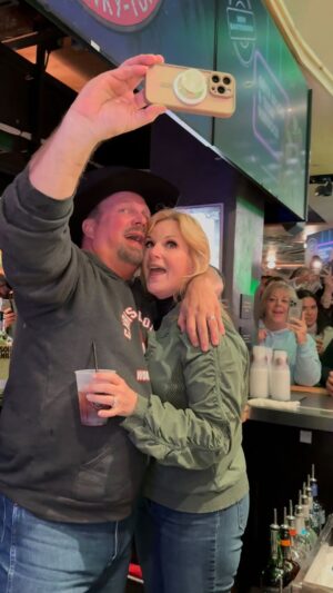 Trisha Yearwood Instagram - One year down and what a way to celebrate! 🍻 Our favorites were on fire behind the bar - @garthbrooks & @trishayearwood , we couldn’t ask for better Friends! Serving up some Cheers In A Cup to CHEERS an unforgettable experience and many more to come! ✨