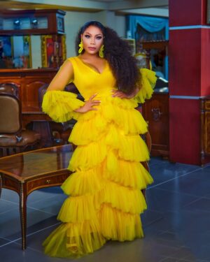 Zynnell Zuh Instagram - Golden blooms and vibrant dreams. Drifting in elegance, one flowy step at a time. Cheers to new beginnings this April! #Zyellegant #LuxuryFashion #BoldAndBeautiful” 

Dress @zyellegant 
Shot by @cassidy_films