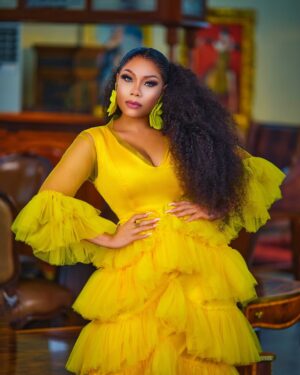 Zynnell Zuh Instagram - Golden blooms and vibrant dreams. Drifting in elegance, one flowy step at a time. Cheers to new beginnings this April! #Zyellegant #LuxuryFashion #BoldAndBeautiful” 

Dress @zyellegant 
Shot by @cassidy_films