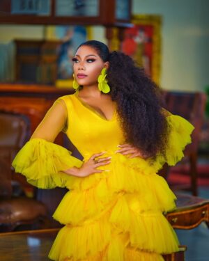 Zynnell Zuh Instagram - Golden blooms and vibrant dreams. Drifting in elegance, one flowy step at a time. Cheers to new beginnings this April! #Zyellegant #LuxuryFashion #BoldAndBeautiful” 

Dress @zyellegant 
Shot by @cassidy_films