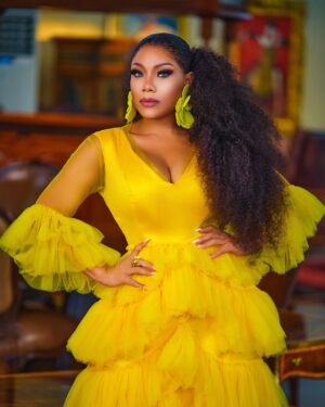 Zynnell Zuh Instagram - Golden blooms and vibrant dreams. Drifting in elegance, one flowy step at a time. Cheers to new beginnings this April! #Zyellegant #LuxuryFashion #BoldAndBeautiful” 

Dress @zyellegant 
Shot by @cassidy_films