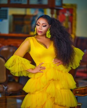 Zynnell Zuh Instagram - Golden blooms and vibrant dreams. Drifting in elegance, one flowy step at a time. Cheers to new beginnings this April! #Zyellegant #LuxuryFashion #BoldAndBeautiful” 

Dress @zyellegant 
Shot by @cassidy_films